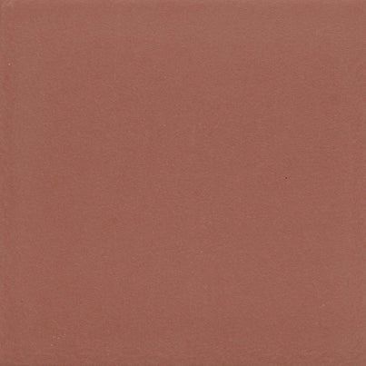 Solid square of terracotta-colored tile.