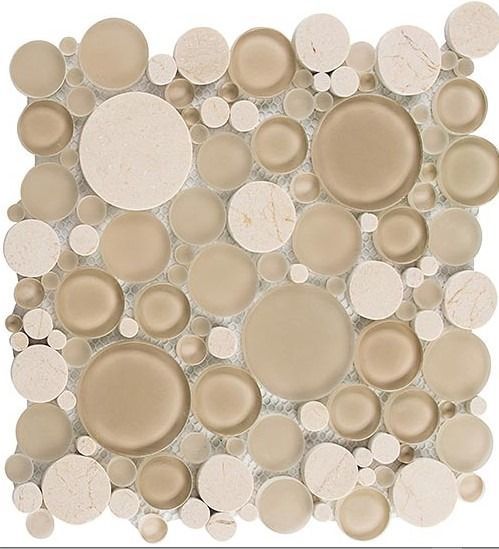 Beige and cream circular mosaic tile pattern.