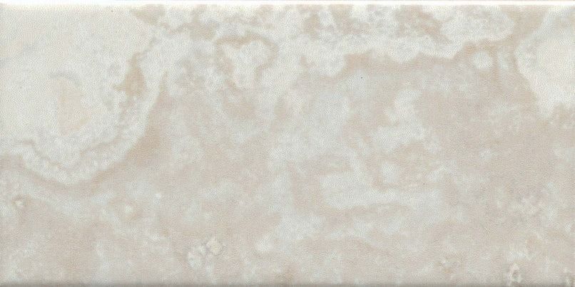 Beige rectangular tile with cloudy, light-colored patterns.