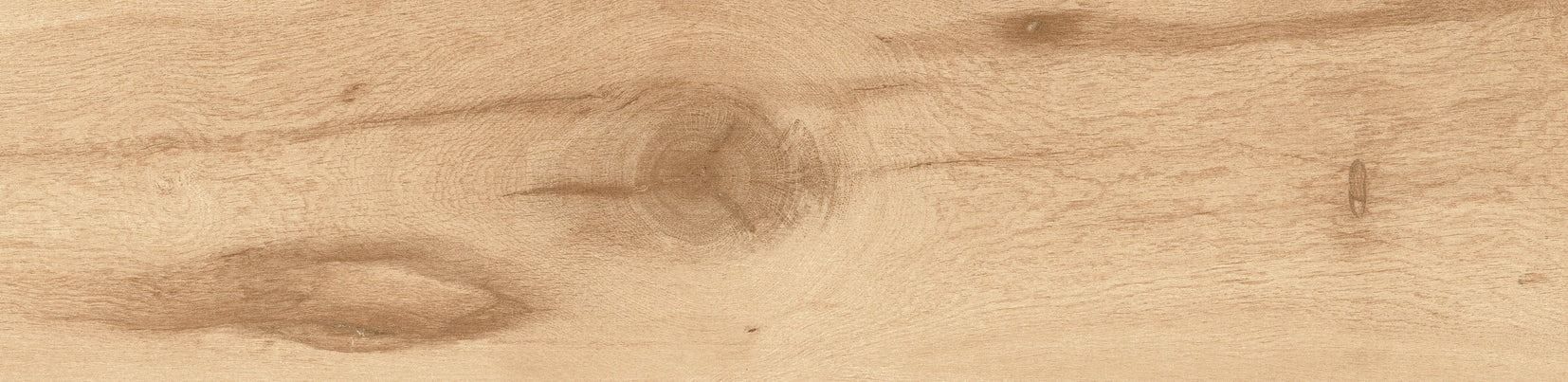 Close-up of a wood grain pattern with light brown and darker brown streaks.