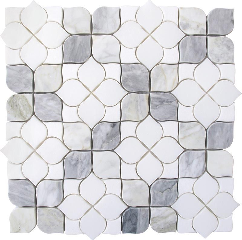 White and gray marble tile in a stylized floral pattern.