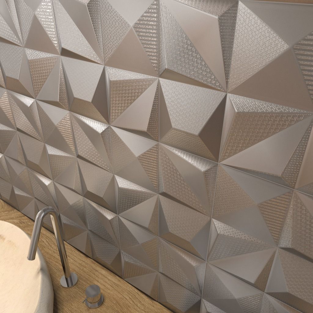 Geometric, textured wall in shades of silver and gray, with a chrome faucet.