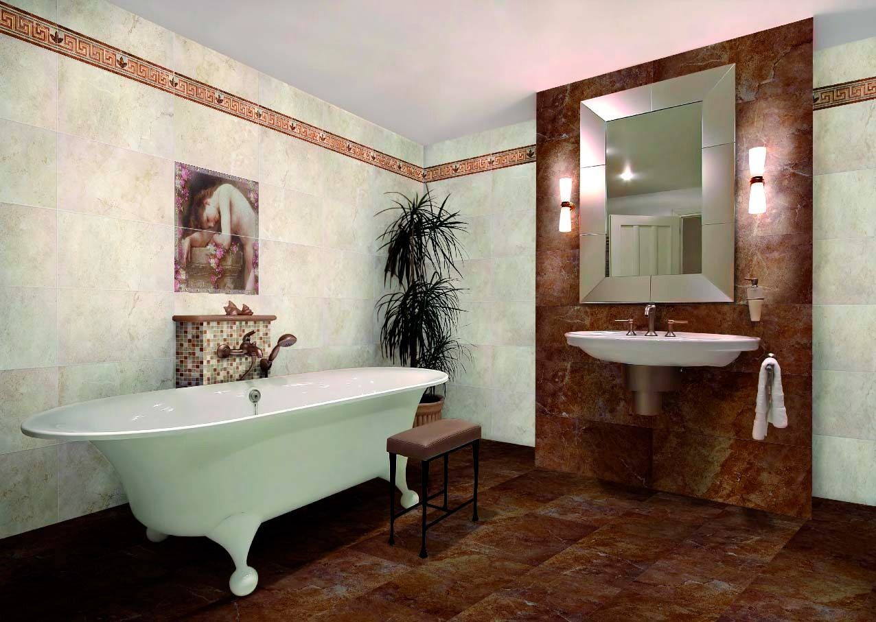 Bathroom with clawfoot tub, pedestal sink, brown and cream tile, mirror, and potted plant.