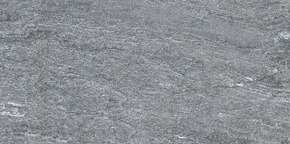 Close-up of a gray stone surface with subtle texture and horizontal lines.