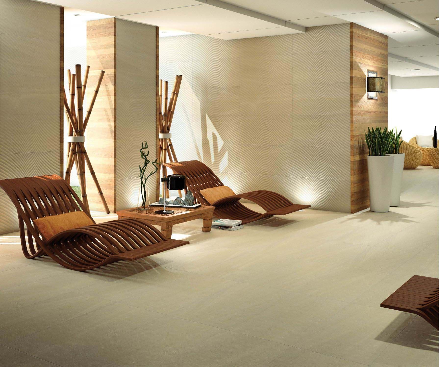 Relaxation lounge with wooden chaise lounges, bamboo, and neutral tones.