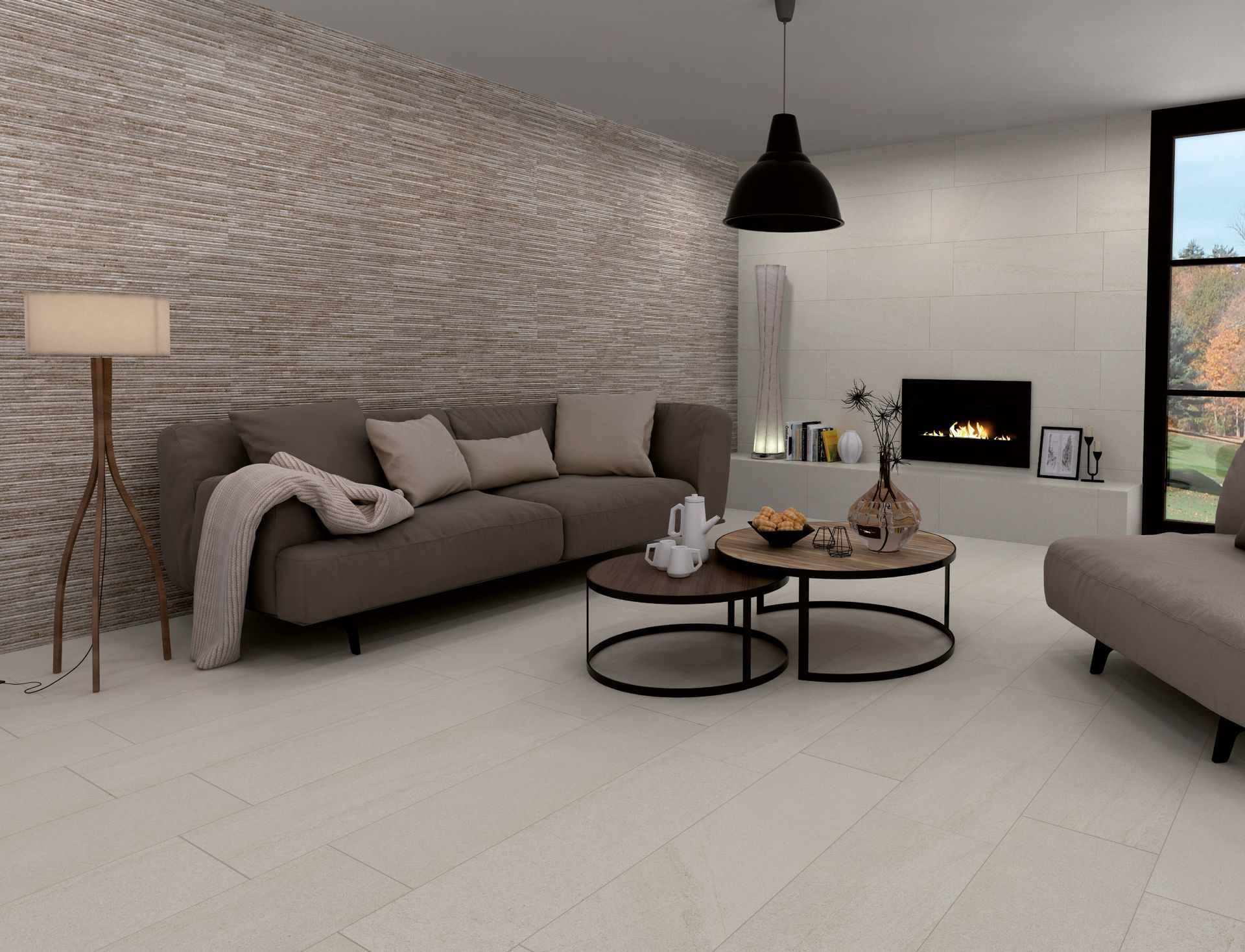 Living room with a sofa, coffee tables, fireplace, and patterned accent wall. Neutral color palette.