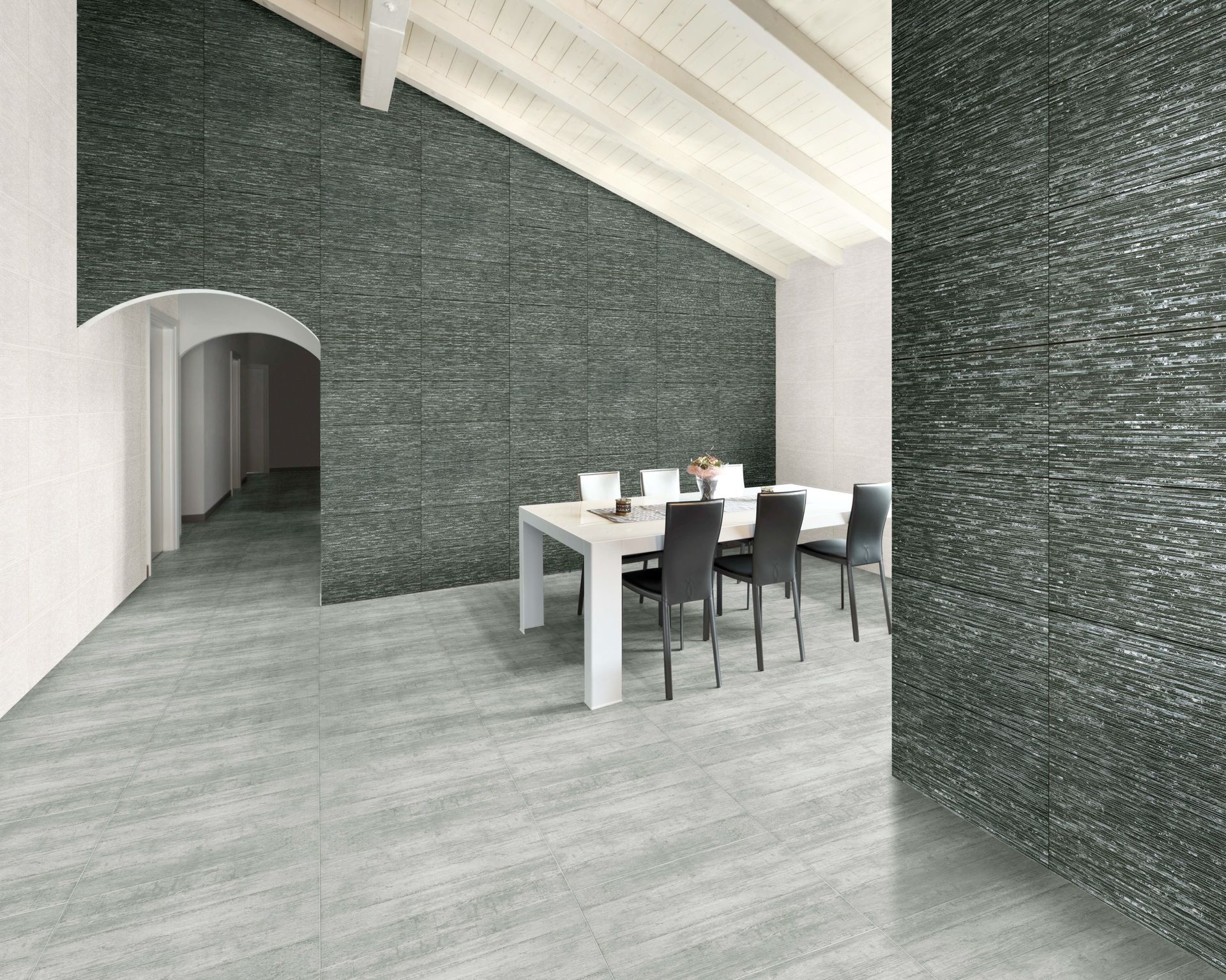 Dining room with textured gray wall, white table, chairs, and tiled floor.