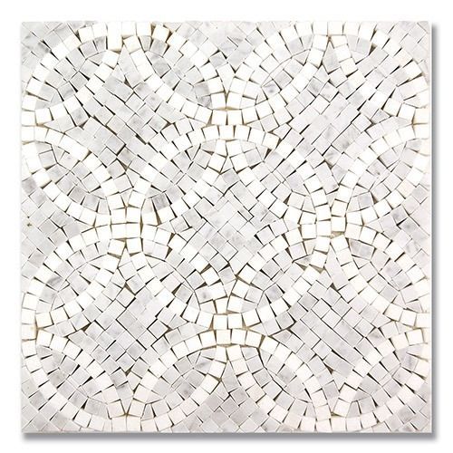 White marble mosaic tile with a repeating curved design.