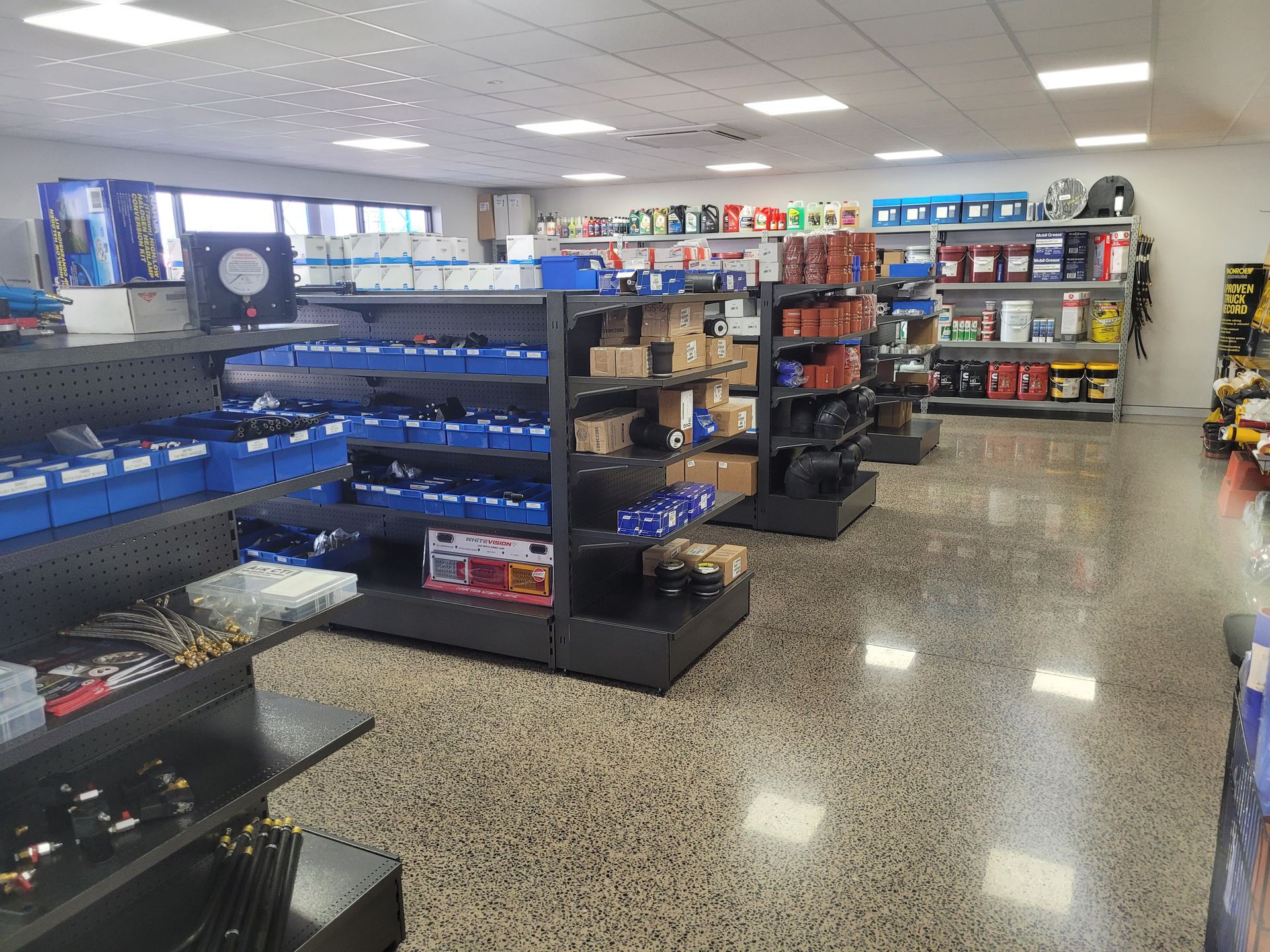 Interior of a parts store with shelves of items — Top End Diesel In Wishart, NT
