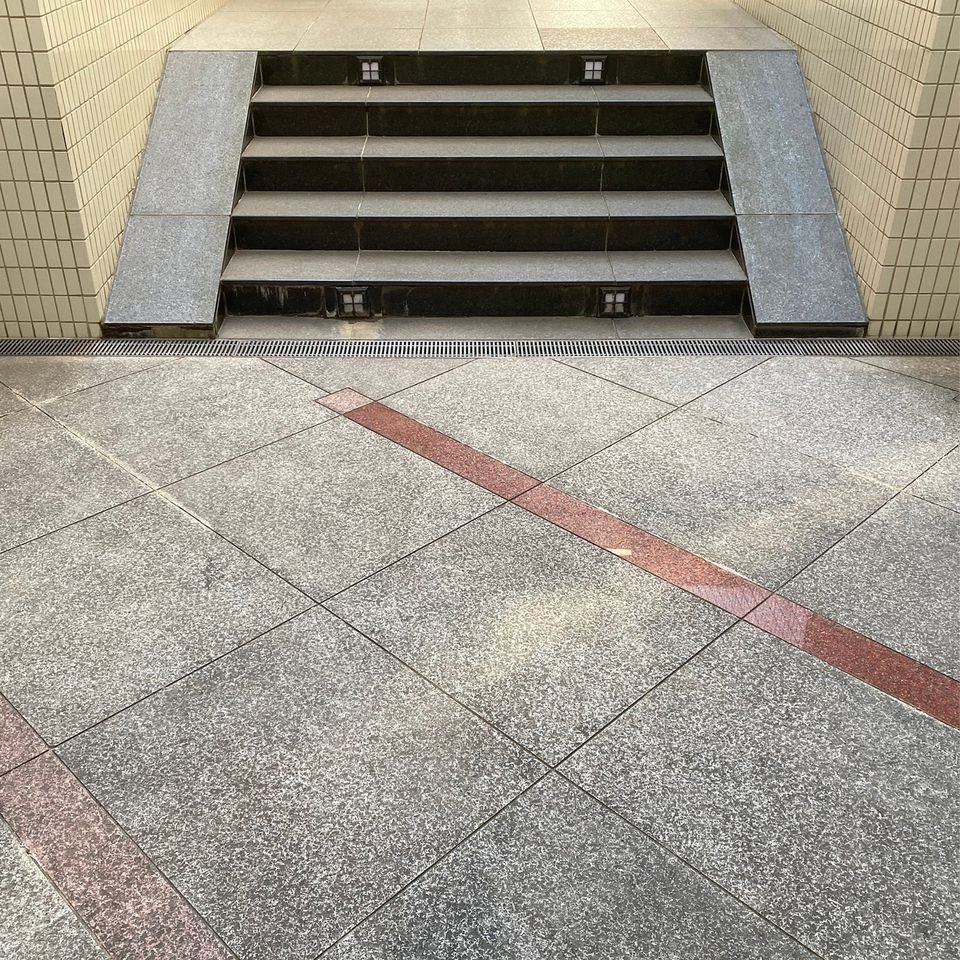 A set of stairs leading up to a building.