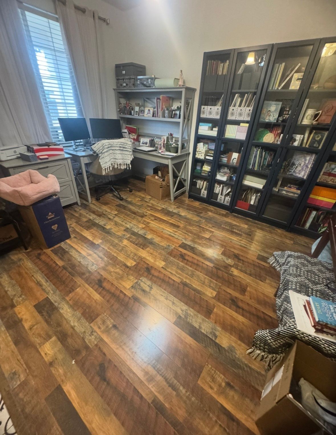 The inside of an empty refrigerator with the door open.