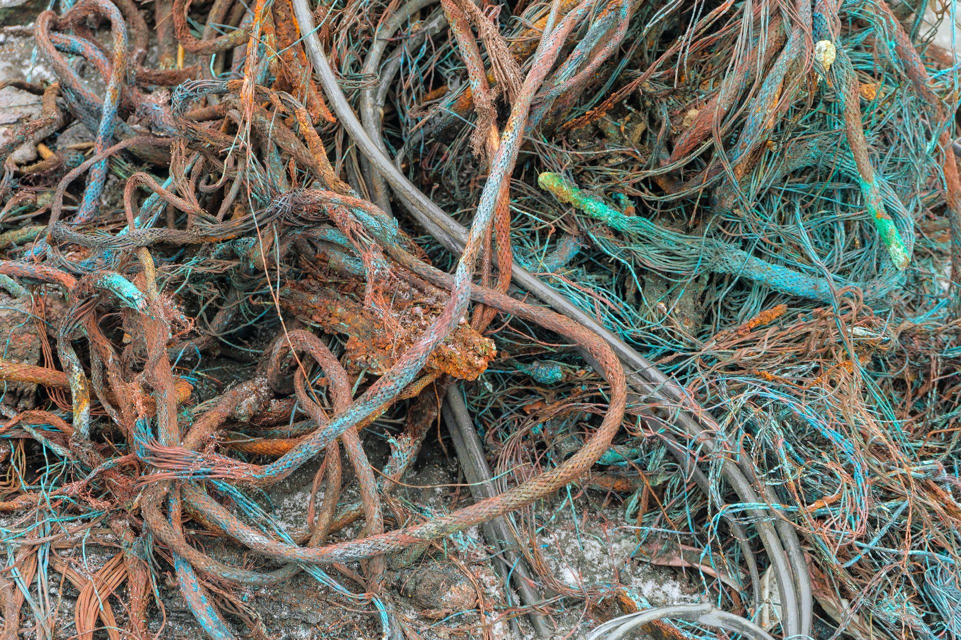 Closeup of copper wires after being burned for recycling purposes.