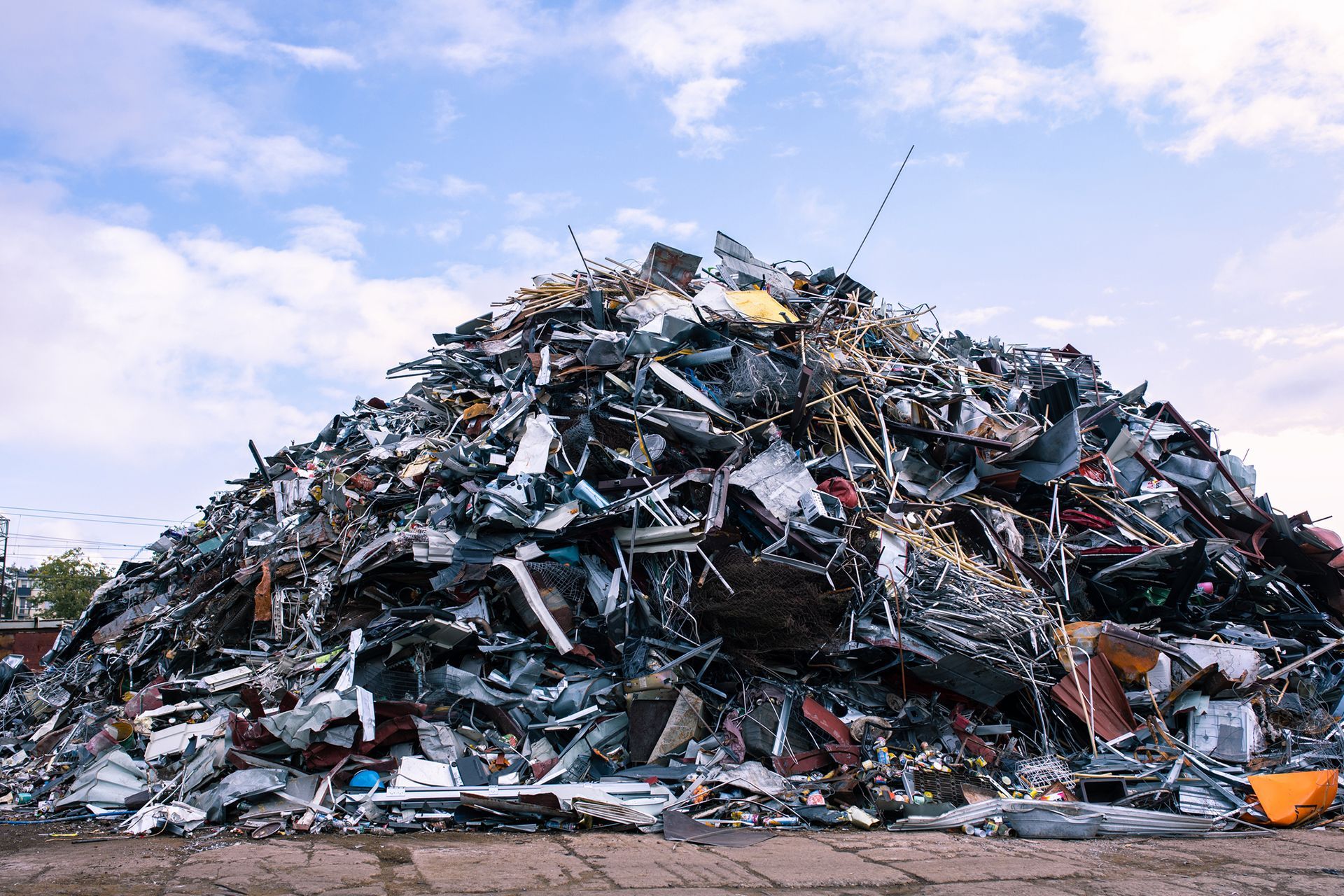 Towering mountain of unidentifiable scrap metal.