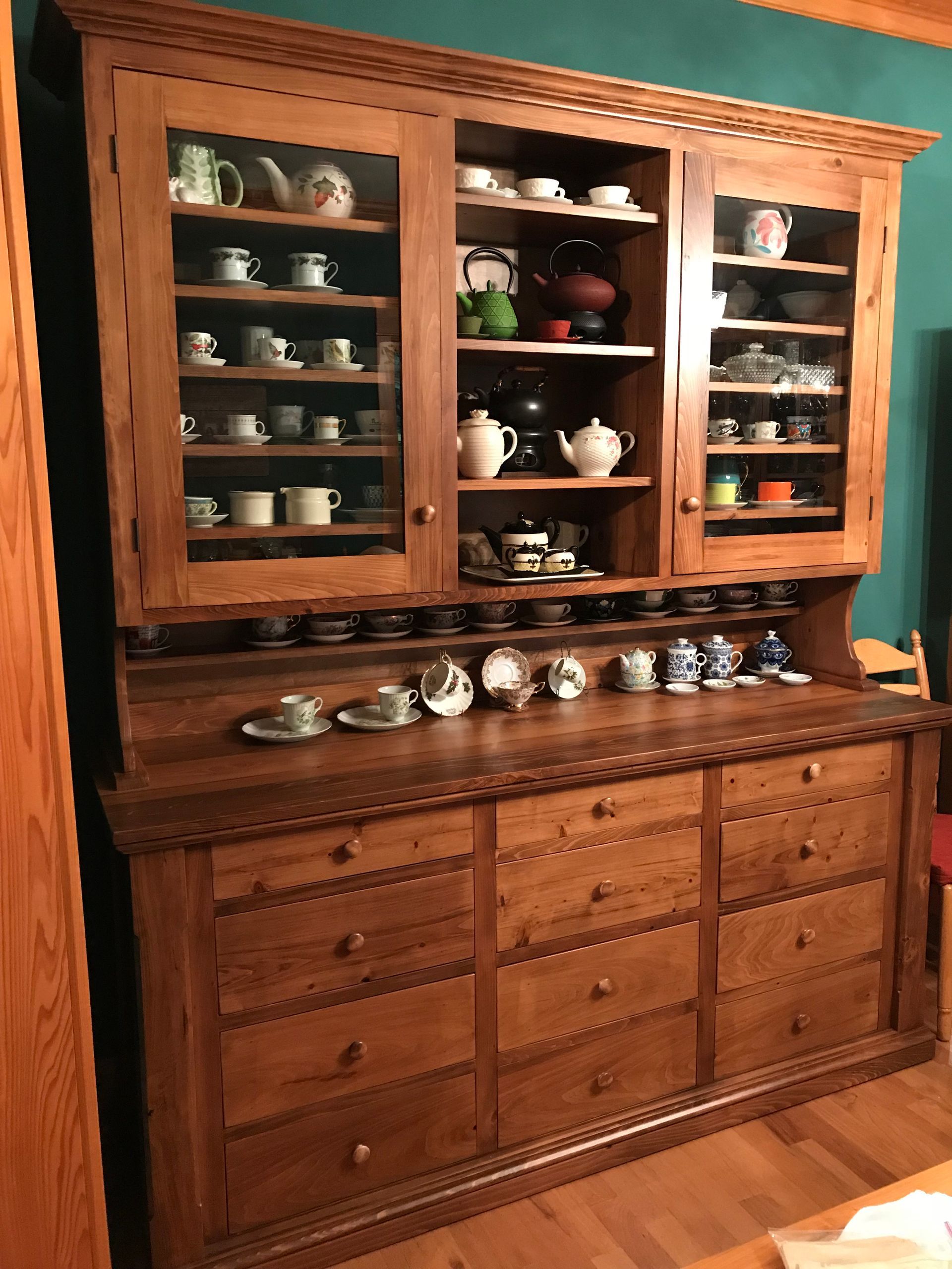 Custom designed and built tea cabinet to store cup collection, teas, and silverware.