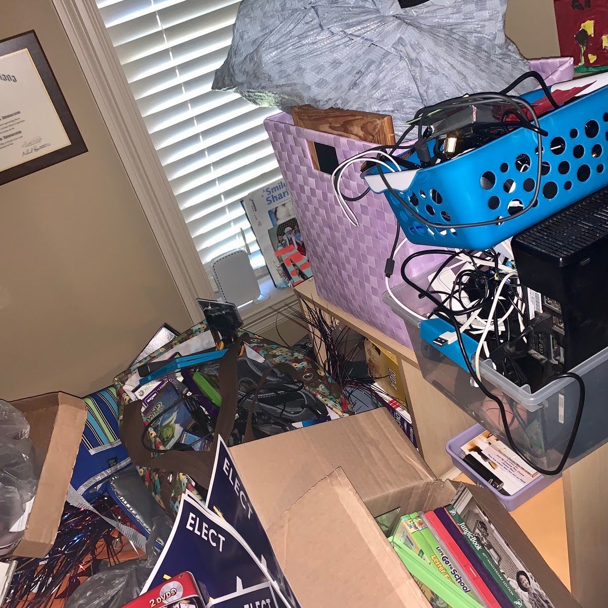 A room filled with lots of boxes and electronics