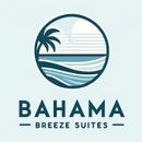 a logo for bahama breeze suites with a palm tree in the middle