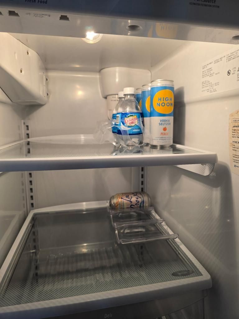 Carboard Boxes Besides a Bed