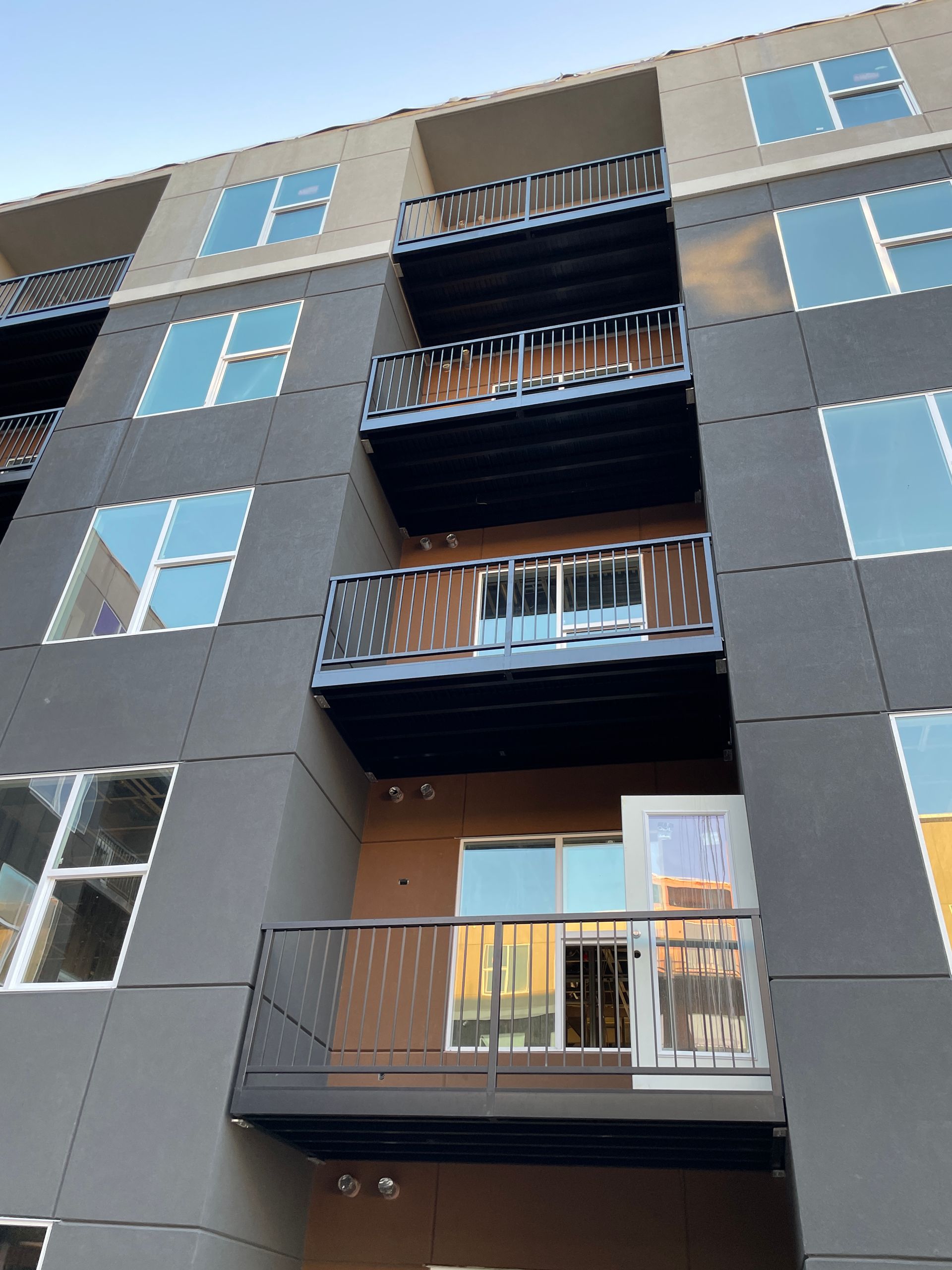 A building with a lot of windows and balconies