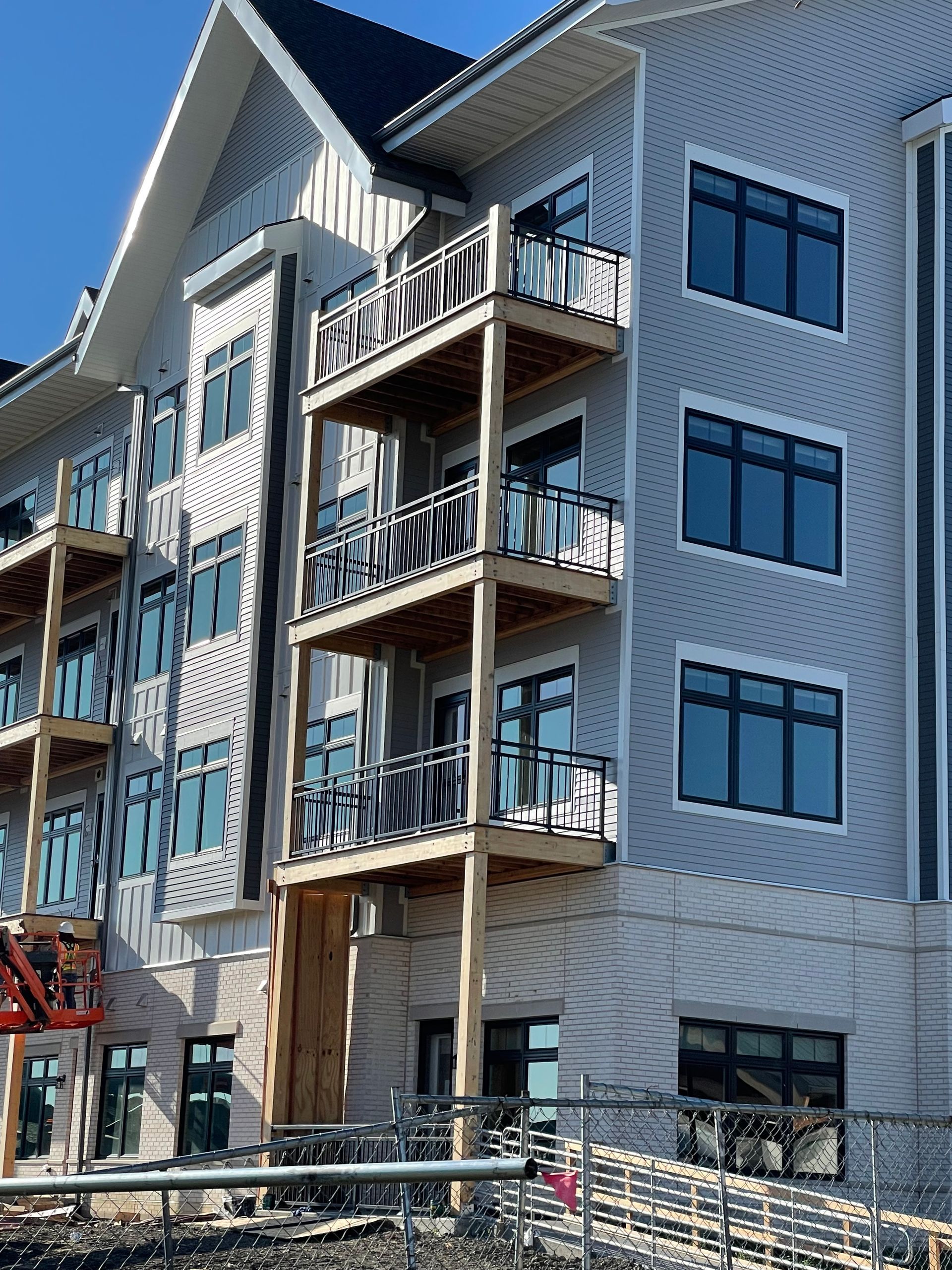 A large building with a lot of windows and balconies
