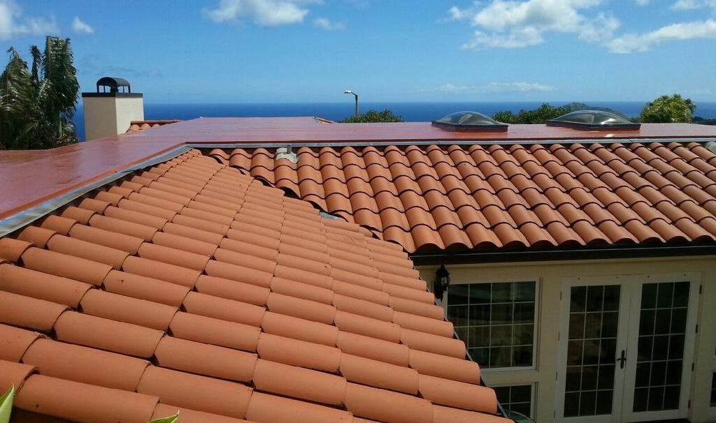 Red roof tiles professionally installed by On Top Roofing