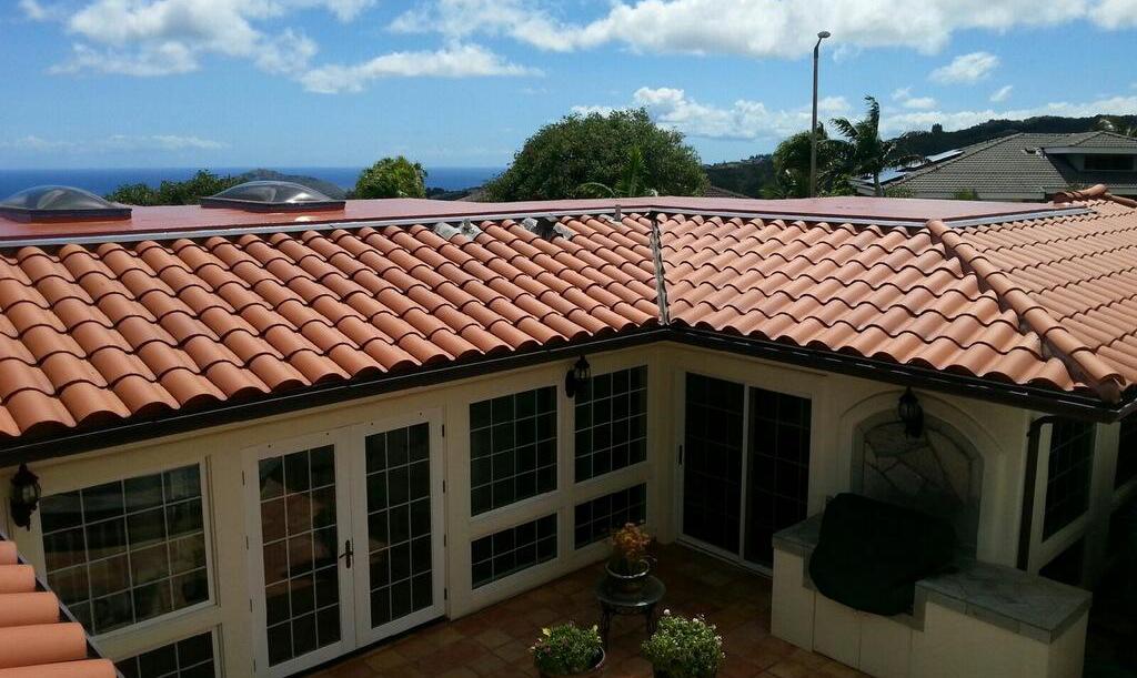 Red roof tiles installed by On Top Roofing