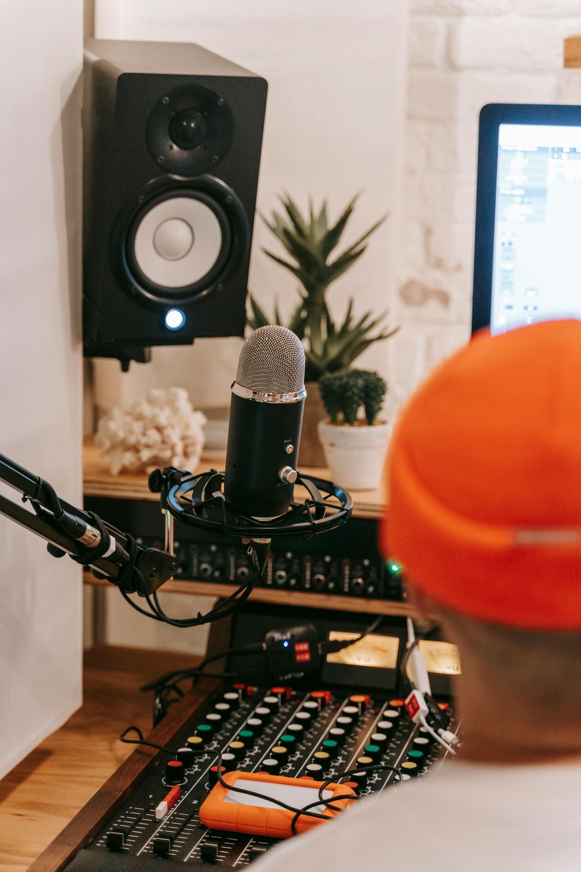 A close up of a mixer with a lot of knobs on it.