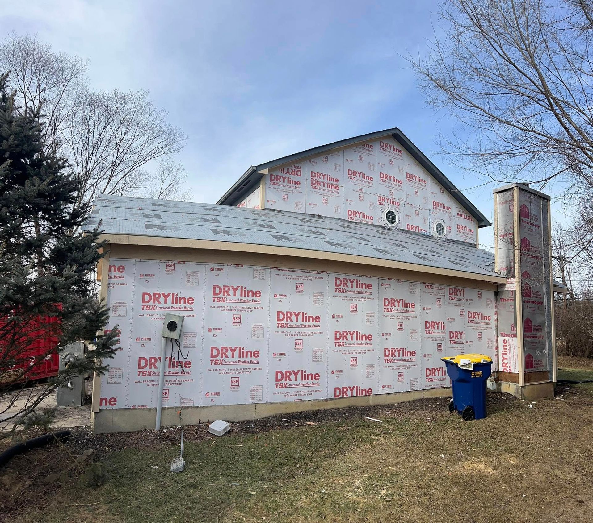A house with a roof that is covered in dryline