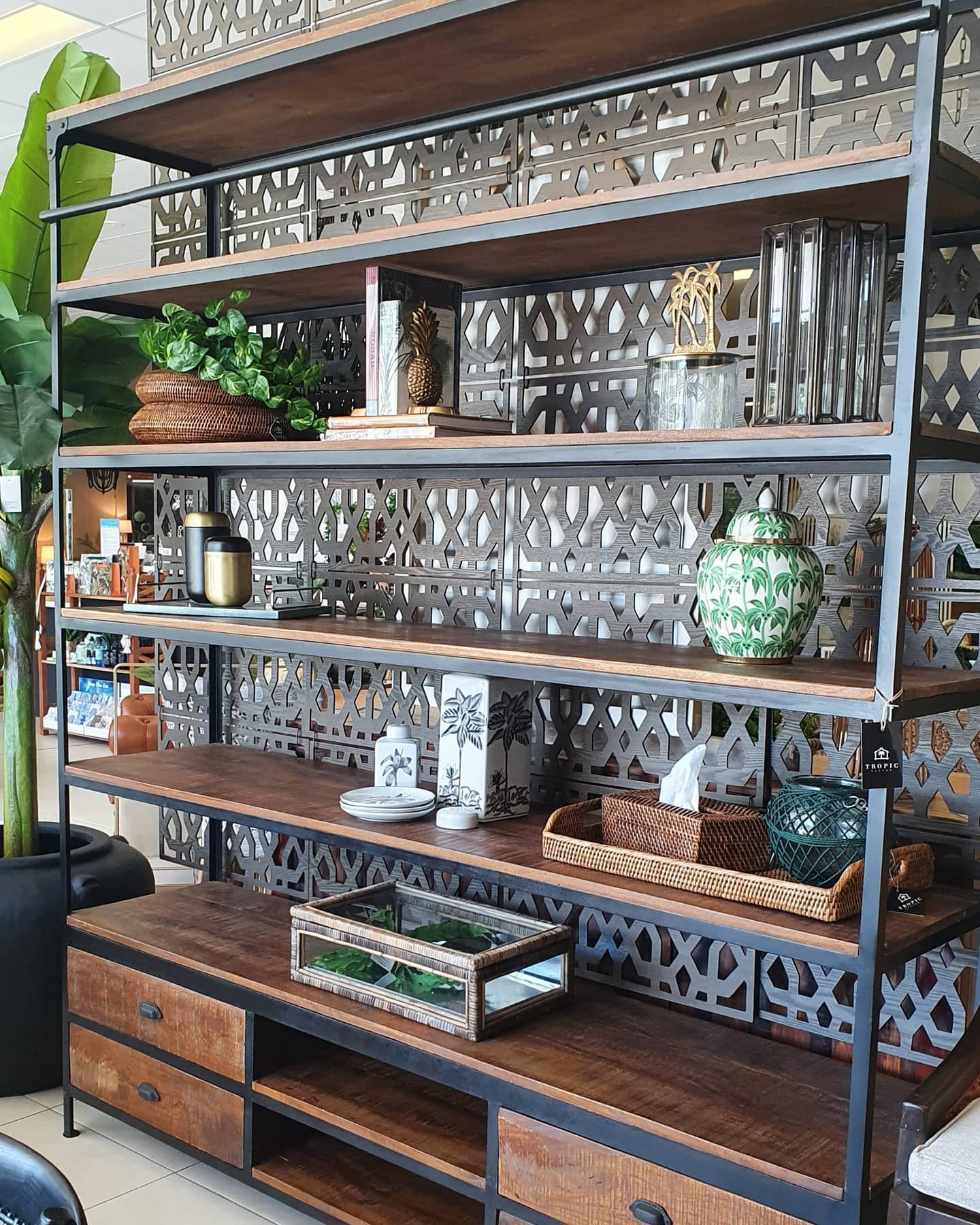 Wooden and Metal Shelf Unit with Decorative Items; Plants, Vases, and Books — Tropic Living in Port Douglas, QLD