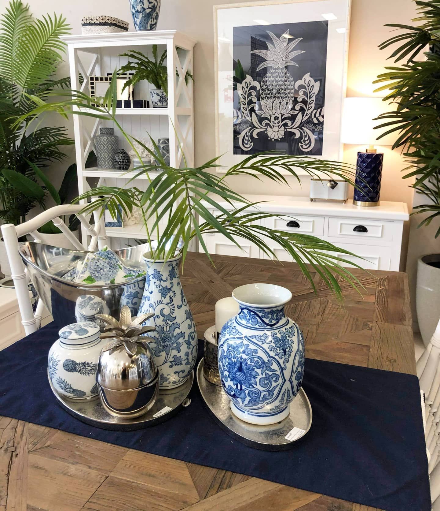 Blue and White Vases, Silver Trays, and Decor; Pineapple Print on Wall — Tropic Living in Palm Cove, QLD