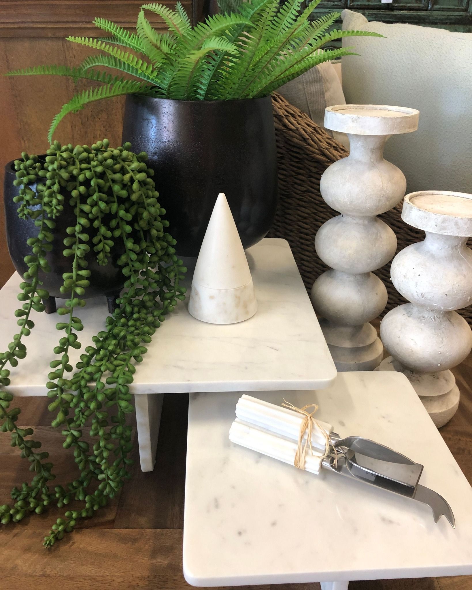 Display of Potted Plants and Decorative Objects on White Marble Surfaces — Tropic Living in Kewarra Beach, QLD