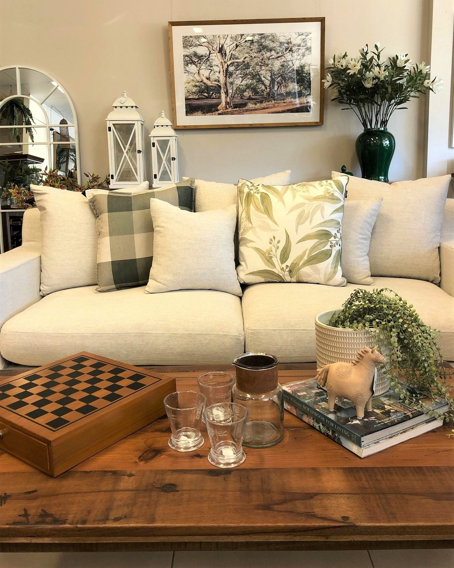 Living Room with White Couch & Decor — Tropic Living in Palm Cove, QLD