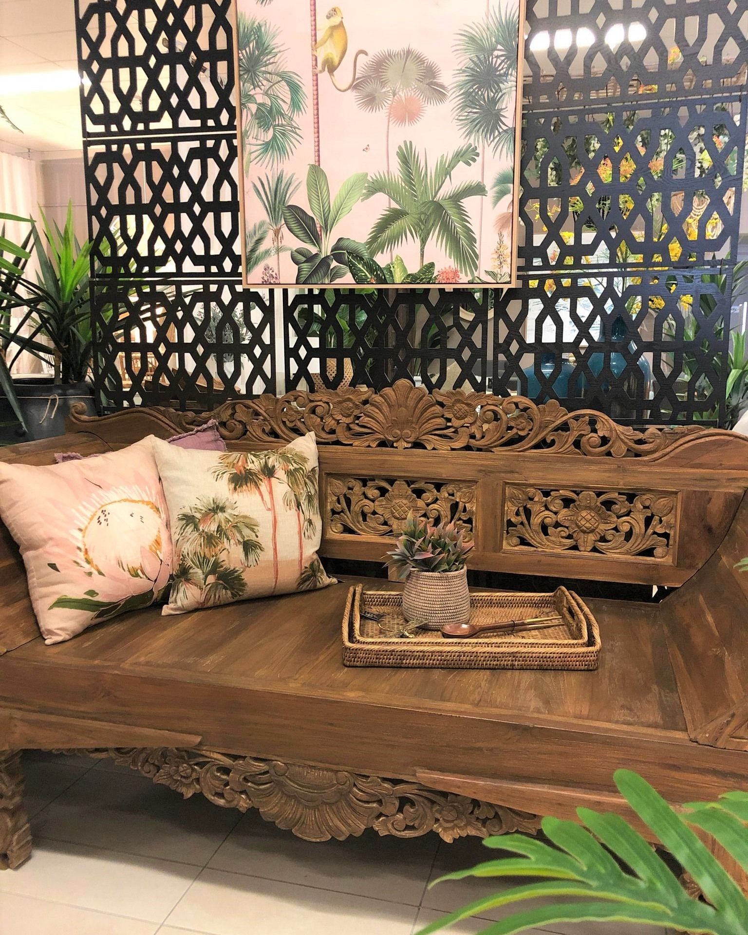 Wooden Sofa with Pillows, Tray, and Botanical Print; Black Lattice Backdrop — Tropic Living in Palm Cove, QLD