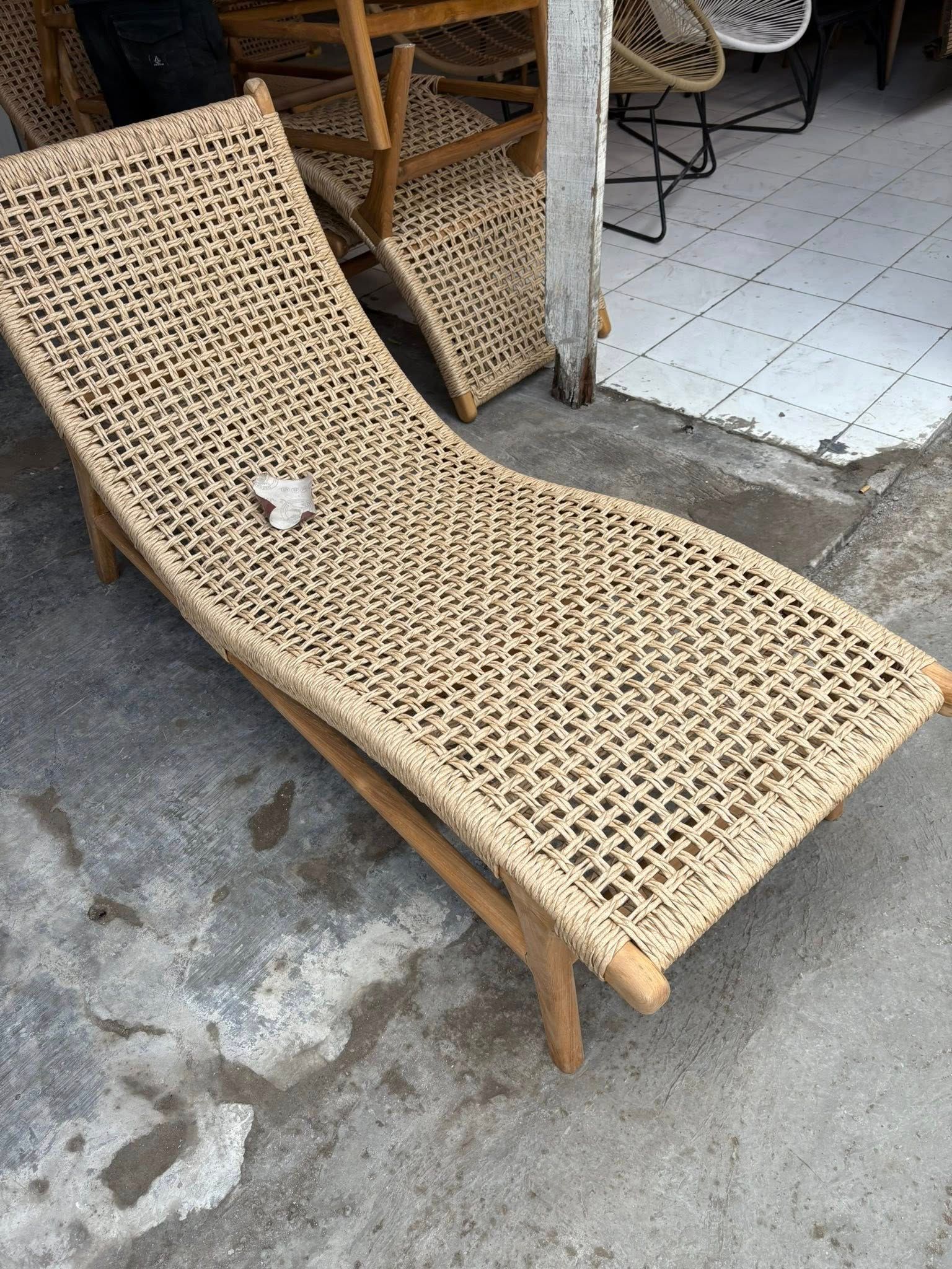 Woven Beige Chaise Lounge on A Concrete Surface — Tropic Living - Cairns in Trinity Beach, QLD