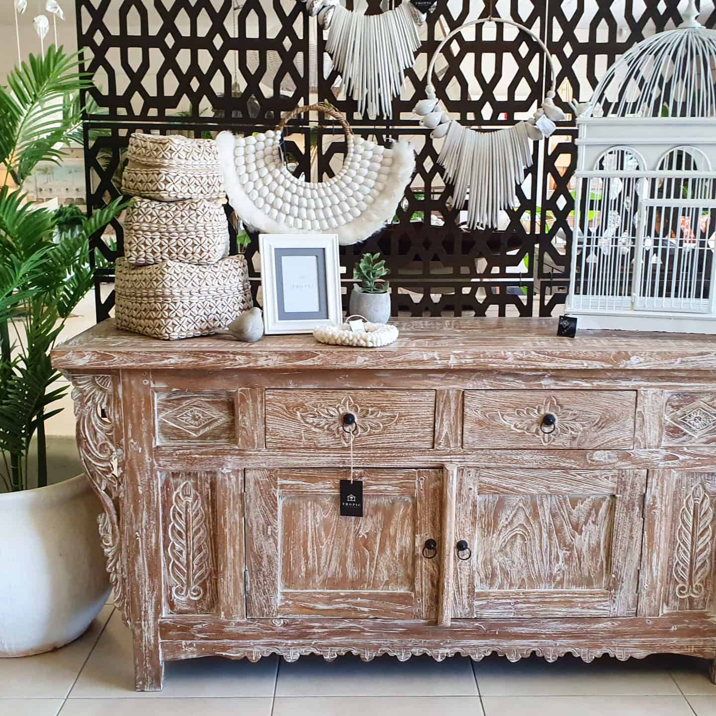 Wooden Cabinet with Decor — Tropic Living in Smithfield, QLD
