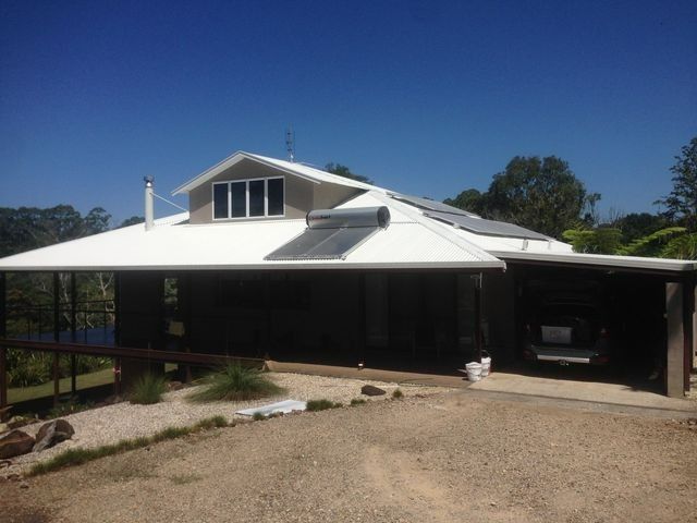 White Roof with Solar Panels — All Roof Restorations & Solar In Ballina, NSW