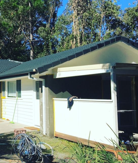 White House with Black Roof — All Roof Restorations & Solar In Northern Rivers, NSW