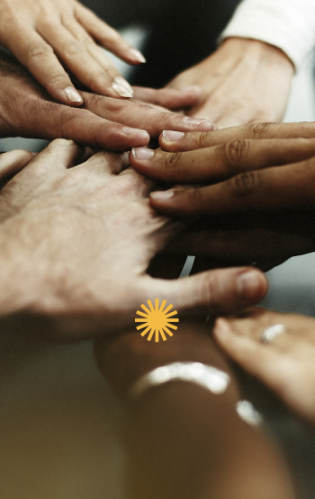 Interracial hands holding - Mosaic Church, Freeport, FL