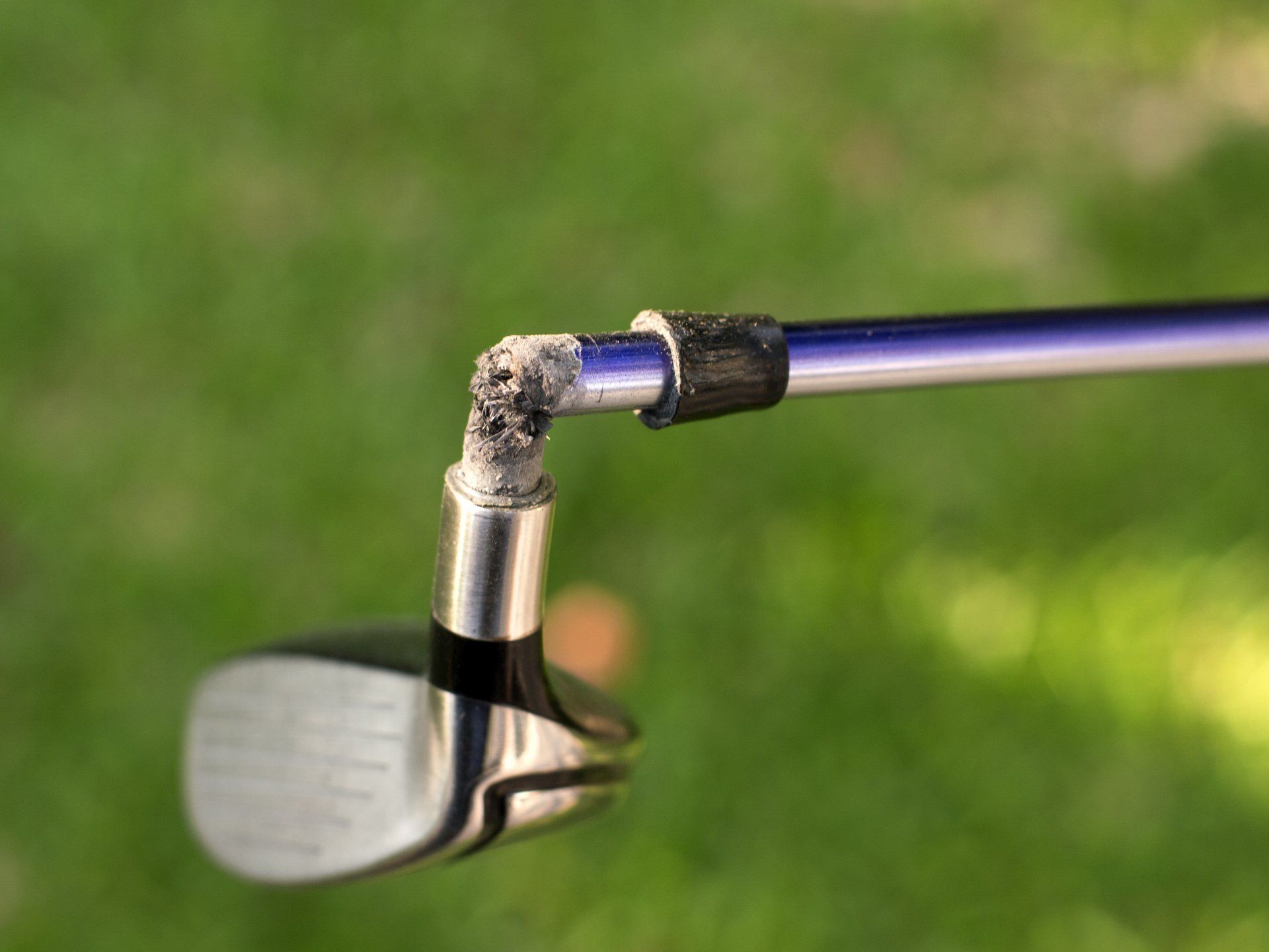 Broken golf club shaft.