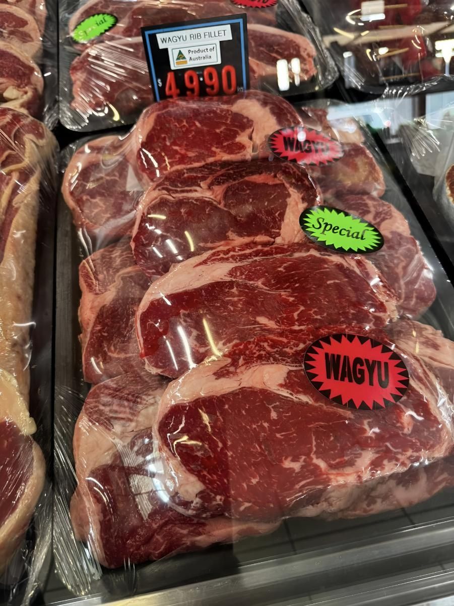 A Tray of Steaks With a Sticker That Says Wagyu — MBW Wholesale & Bulk In Cannonvale, QLD