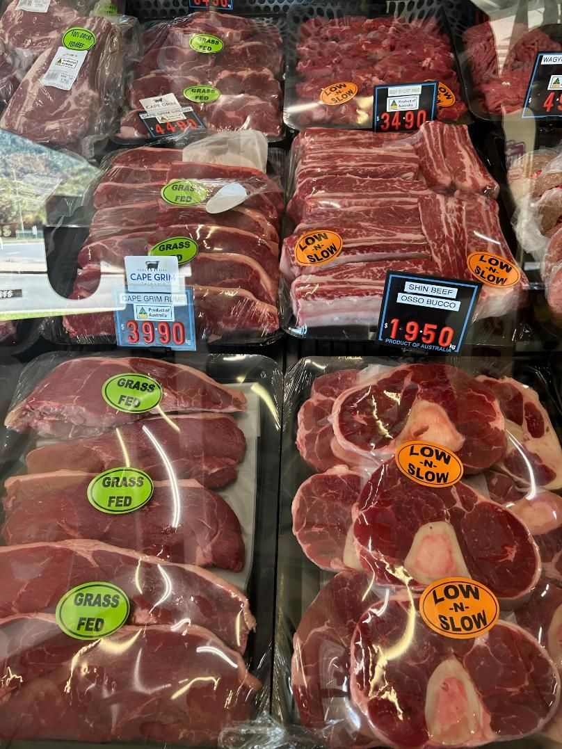A Variety of Meats Are Displayed in a Butcher Shop — MBW Wholesale & Bulk In Cannonvale, QLD