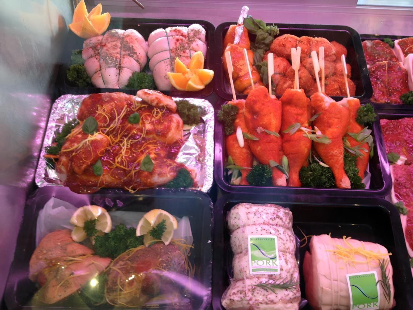 A Display Case Filled With a Variety of Meats and Vegetables — MBW Wholesale & Bulk In Cannonvale, QLD