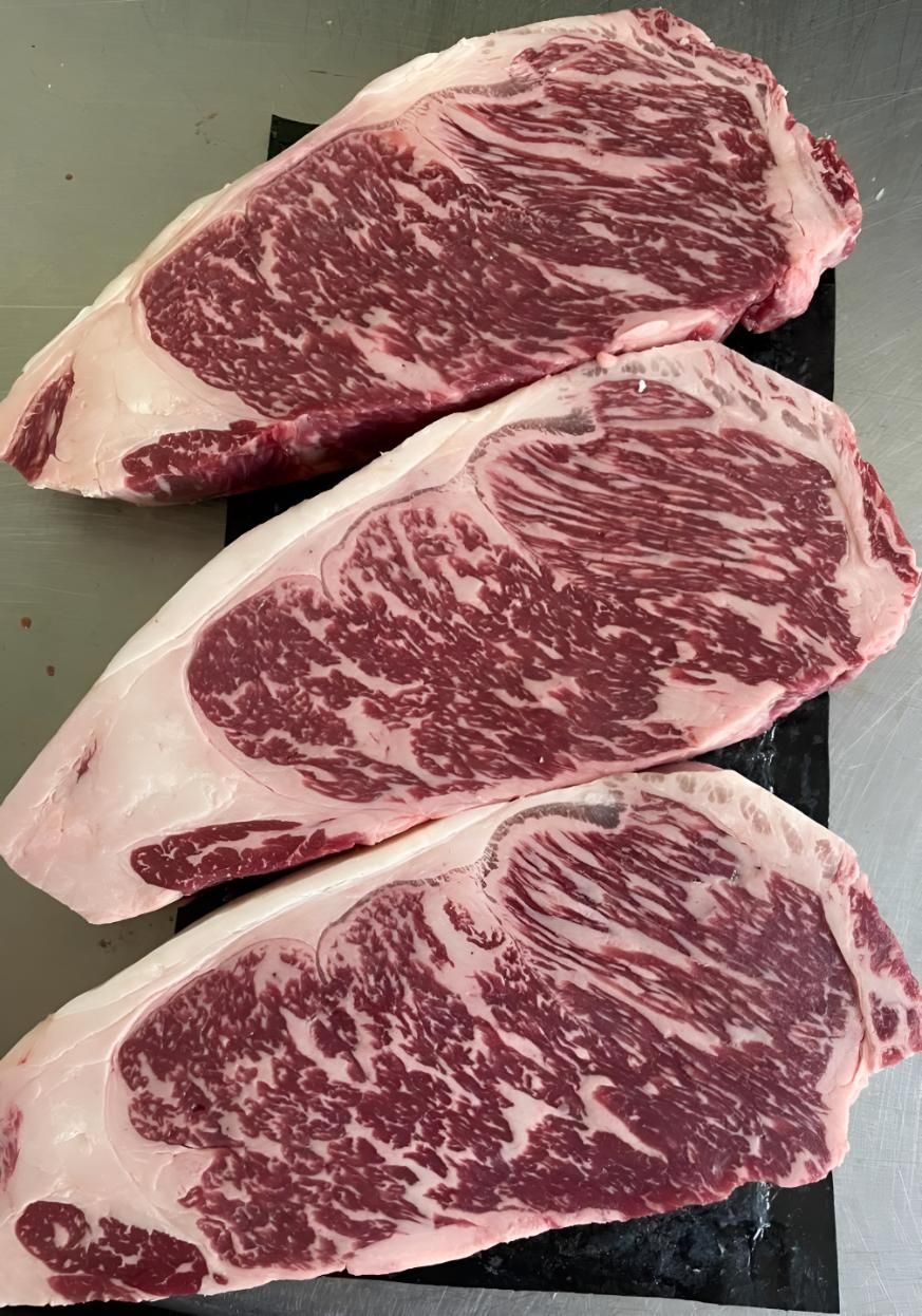 Three Steaks Are Sitting on Top of Each Other on a Table — MBW Wholesale & Bulk In Cannonvale, QLD