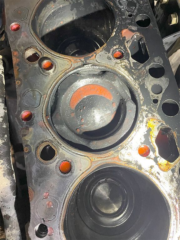 melted piston on a 5.9 Cummins diesel engine