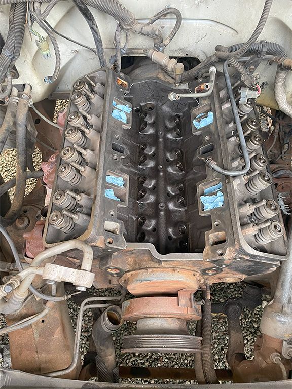 mechanic replacing engine gaskets