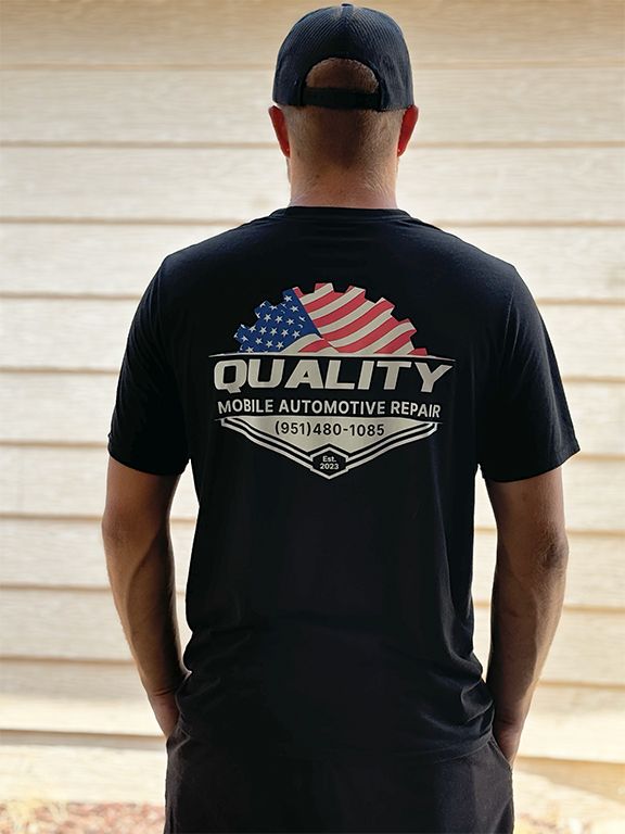 man wearing his company t-shirt