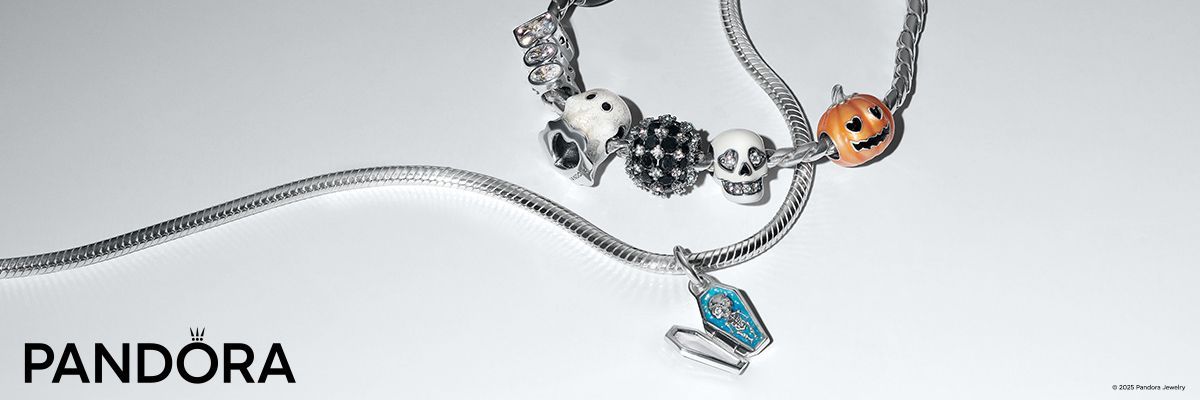 Pandora jewelry, Halloween-themed charms, a bracelet with pumpkin and skull beads.