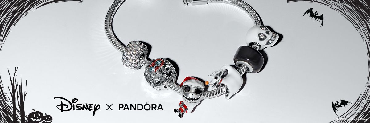 Pandora bracelet with Nightmare Before Christmas charms on white background.