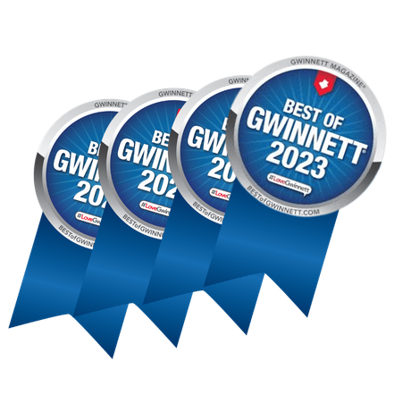 Four blue ribbons that say best of gwinnett 2023