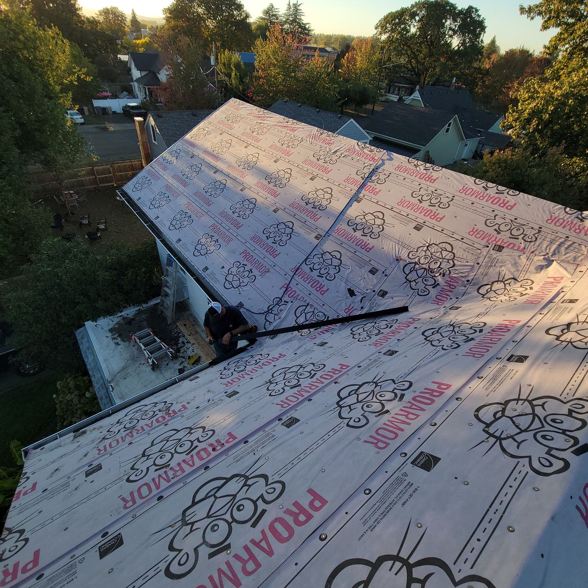 An aerial view of a roof with proarmor foam on it
