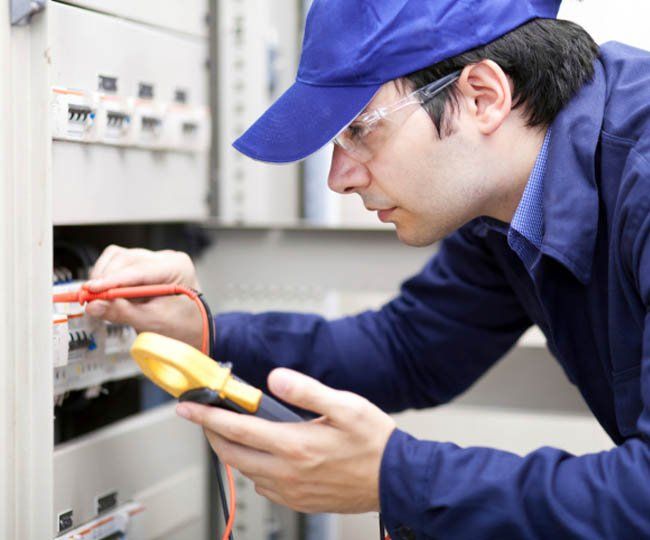 lectrician at work — Electrical Repair Troubleshooting in Petersburg, FL